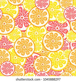 Seamless vector citrus pattern. Fruit background. Summer bright background with lemon, grapefruit and orange.