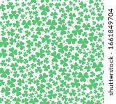 Seamless vector clover background for St. Patrick's Day pattern. Green clover leaves of different sizes and shapes are collected in a seamless pattern. Seamless pattern with the symbol of Ireland a le