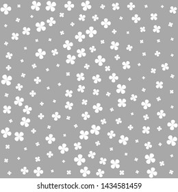 Seamless vector clover pattern. Chaotic four-leaf grey elements background 10 eps. For design, fabric, textile, web, wrapping.