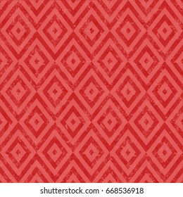 Seamless vector combined floral and geometric pattern. Trendy ethnic fashion print. Modern tribal design in red, pink, coral colors. Exotic collection with hand drown leaves and geometric elements.
