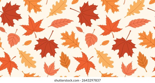 Seamless vector cozy pattern with autumn red, orange, and yellow leaves