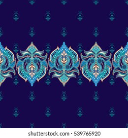 Seamless vector dark background with floral oriental border and ornament on backdrop. Indian paisley pattern