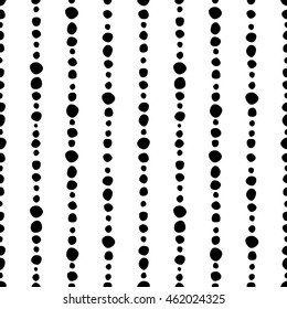 Seamless vector decorative hand drawn pattern. Black and white geometric endless background with dots and vertical lines.