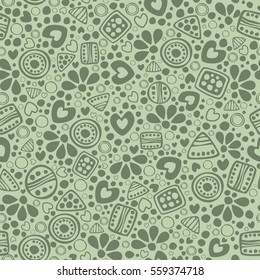 Seamless vector decorative hand drawn pattern. Green ethnic endless background with ornamental decorative elements with traditional motives, tribal geometric figures, dots and flowers..
