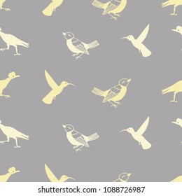 Seamless vector desert birds - light yellow silhouettes on medium warm gray background. Great for patterned scrapbook papers, stationery, textile prints, wallpaper, invitations and product packaging.