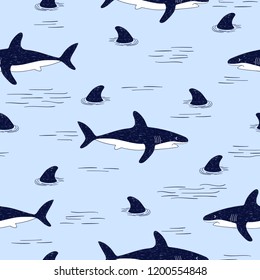 Seamless vector doodle shark pattern.