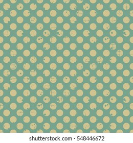 Seamless vector dotted pattern. Green geometric background with circles. Grunge texture with attrition, cracks and ambrosia. Old style vintage design. Graphic illustration..