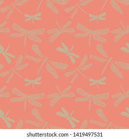 Seamless vector dragonflies pattern on pink background. Surface print design.