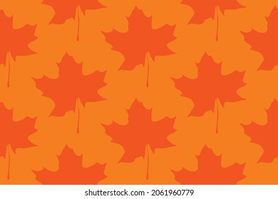 Seamless vector drawing of maple leaves in autumn colors
