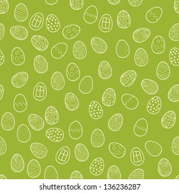 Seamless vector Easter pattern with eggs on a green background