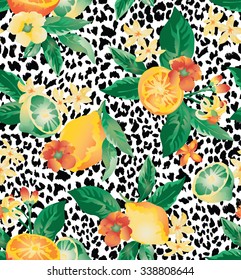 Seamless vector elegant floral pattern with blooming lemons and limes on a  background with leopard skin imitation.