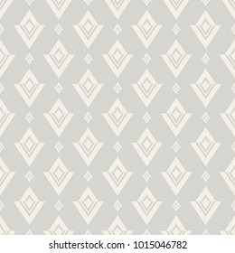 Seamless vector ethnic pattern of the repeating rhombuses on a beige background. Vector color background.