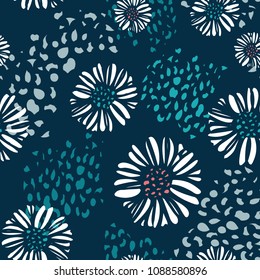 Seamless vector floral background pattern. Sophisticated navy blue, turquoise, white daisy print with organic texture background. Great for textiles, home decor, fashion, cards and stationery items.