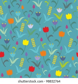Seamless vector floral pattern with colorful tulips on blue background 