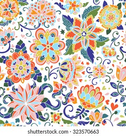 Seamless vector floral pattern. Hand drawn doodle flowers endless background. Can be used for fabrics, wallpapers, greeting and invitation cards, ornamental template for design and decoration. 
