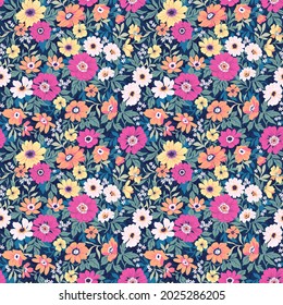 Seamless vector floral pattern. Liberty background of bright colorful realistic flowers. Print with bouquets of flowers from the garden. Bright yellow and purple chrysanthemums on a blue background. 