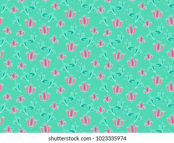 Seamless vector floral pattern with pink bellflowers on green background
