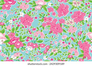 Seamless vector floral pattern. Repeating print with a variety of pink flowers and green leaves on a blue background. Hand drawn illustrations. Apparel textile print.