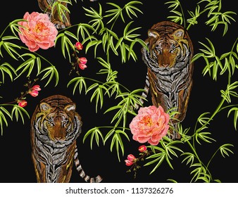 Seamless vector floral summer pattern background with tropical palm leaves, bamboo leaves, a going tiger, peony sakura flowers. Perfect for wallpapers, web page backgrounds, surface textures, textile.