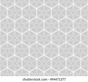 Seamless vector geometric background in arabian style. Islamic pattern, ethnic ornament. Endless hexagonal texture for wallpaper, banners, invitation cards. Gray and white graphic lace background