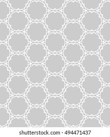 Seamless vector geometric background in arabian style. Islamic pattern, ethnic ornament. Endless hexagonal texture for wallpaper, banners, invitation cards. Gray and white graphic lace background