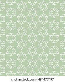 Seamless vector geometric background in arabian style. Islamic pattern, ethnic ornament. Endless hexagonal texture for wallpaper, banners, invitation cards. Green and white graphic lace background