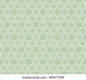 Seamless vector geometric background in arabian style. Islamic pattern, ethnic ornament. Endless hexagonal texture for wallpaper, banners, invitation cards. Green and white graphic lace background