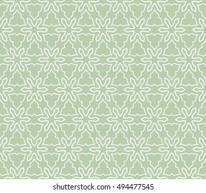 Seamless vector geometric background in arabian style. Islamic pattern, ethnic ornament. Endless hexagonal texture for wallpaper, banners, invitation cards. Green and white graphic lace background
