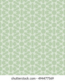 Seamless vector geometric background in arabian style. Islamic pattern, ethnic ornament. Endless hexagonal texture for wallpaper, banners, invitation cards. Green and white graphic lace background