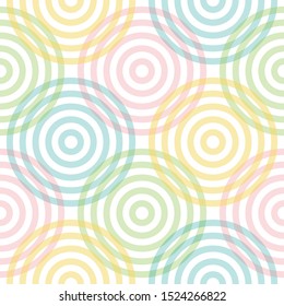 Seamless vector geometry pattern in a modern, stylish, and minimal fashion. The abstract tiles can be repeated endlessly to create perfect pattern/wallpaper of pink blue green yellow color circles.
