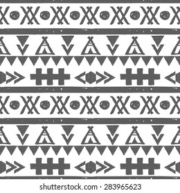 Seamless vector gray and white pattern in the style of boho or hippy. Tribal elements