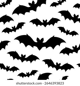 Seamless vector halloween pattern with bat silhouettes on white background