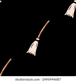 Seamless vector Halloween pattern with witch brooms isolated on black background