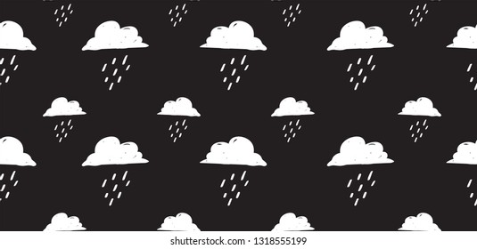 Seamless vector hand drawn black and white pattern with clouds and rain drops