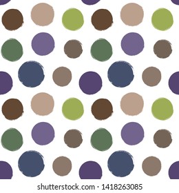Seamless vector hand drawn pattern with big doodle polka dots in natural earth tones 