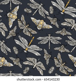 Seamless vector hand drawn pattern with fantasy butterflies, dragonflies, beetles, bugs and mothes in modern style. Beautiful botany illustration.