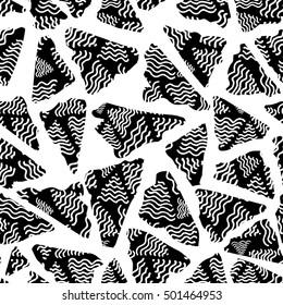 Seamless vector hand drawn triangle background. Doodle abstract monochrome design.
