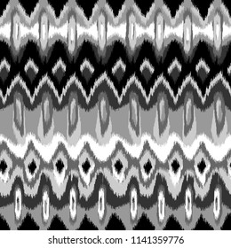 Seamless vector Ikat ethnic background pattern. Monochrome.