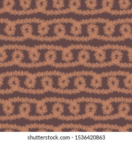 A seamless vector ikat pattern with brown stripes and loops. Unisex surface print design. Great for home decor, stationery and fabrics.