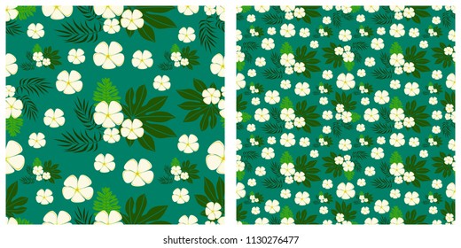 Seamless vector illustration background with plumeria flowers and tropical leaves pattern.