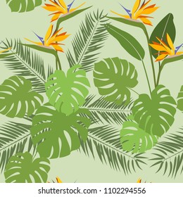 Seamless vector illustration with beautiful tropical plants and flowers on a green background. For decorating textiles, packaging and wallpaper.