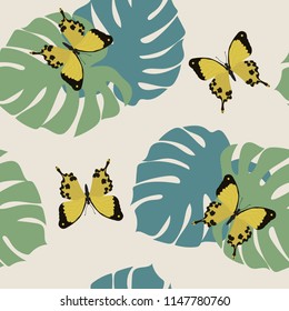 Seamless vector illustration with beautiful tropical butterflies and monster leaves. For decorating textiles, packaging and wallpaper.