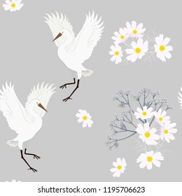 Seamless vector illustration with birds cranes and kosmey flowers on gray background. For decoration of textiles, packaging, wallpaper.