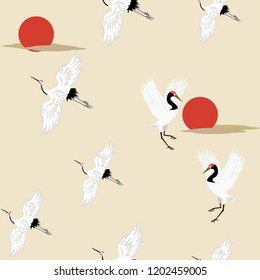 Seamless vector illustration with birds of cranes at sunrise. For decoration of textiles, packaging, wallpaper.