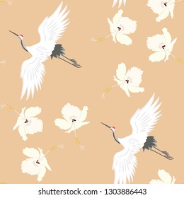 Seamless vector illustration with birds cranes and hibiscus flowers on a beige background. For decorating textiles, packaging, web design.