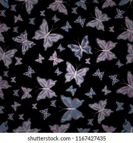 Seamless. Vector illustration. Black, purple and gray butterflies. Superb background for design of fabric, paper, wrappers and wallpaper. Exotic animals.