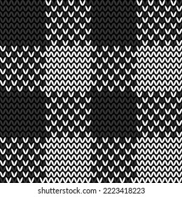 Seamless vector illustration of black and white knit gingham pattern.