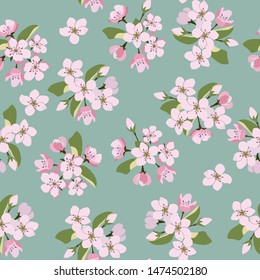 Seamless vector illustration. Blooming sakura on a green background. For textile decoration, packaging, web design.