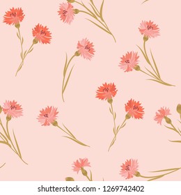 Seamless vector illustration with cornflowers on a pink background. For decorating textiles, packaging, web design.