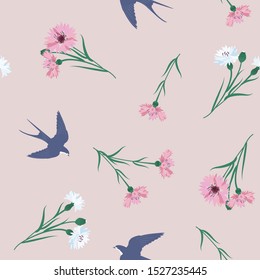 Seamless vector illustration with cornflowers and swallows. For textile decoration, packaging, web design.